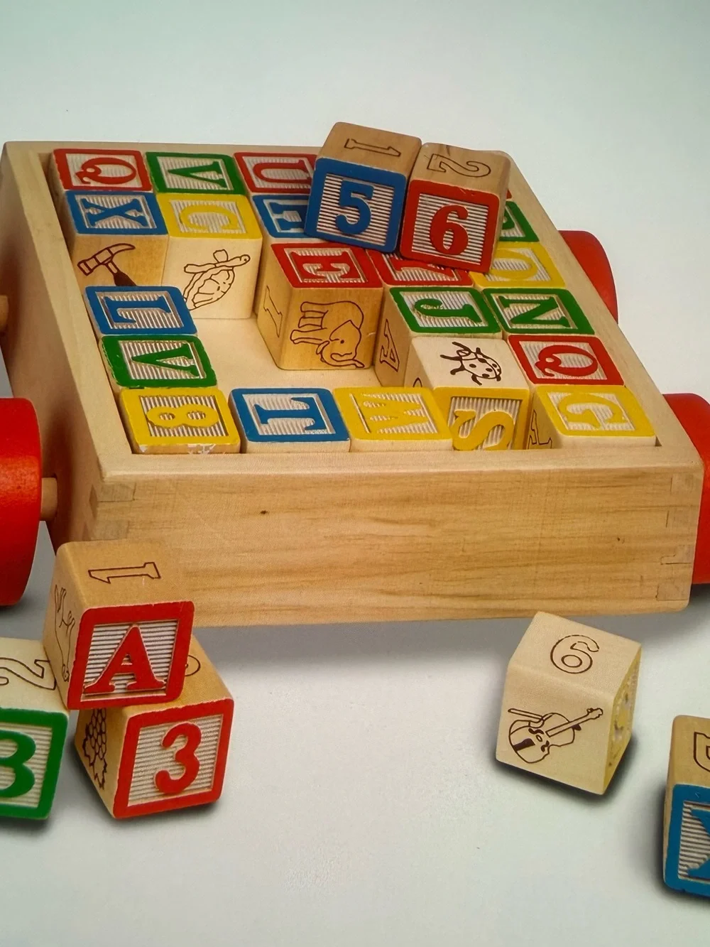 Wooden Alphabet & Number Pull Toy with Red, Blue, Green, Yellow Blocks